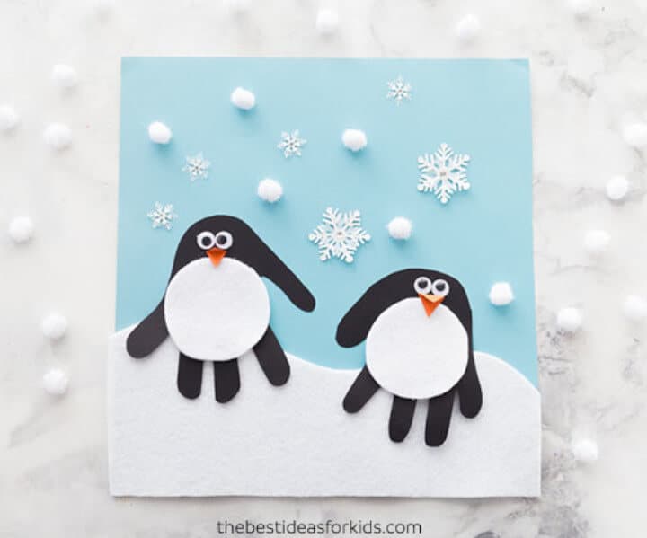 nopin="nopin" penguin handprint card craft for Christmas crafts for kids