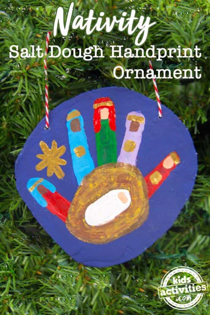 nopin="nopin" Nativity ornament for Christmas tree craft for kids featuring toddler handprint