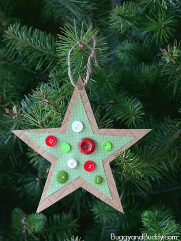 nopin="nopin" Homemade button star ornament hanging from Christmas tree
