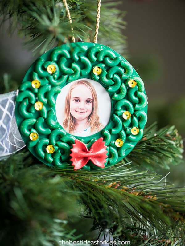 nopin="nopin" framed pasta portrait ornament with picture of girl hanging from a tree