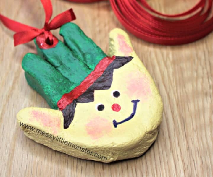 nopin="nopin" Elves Christmas craft for kids made using salt dough and handprint