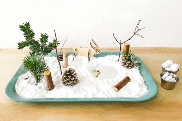 nopin="nopin" Winter themed sensory garden featuring a green bin and fake snow