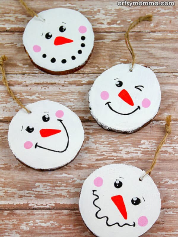 nopin="nopin" Snowman ornaments made with wood slices