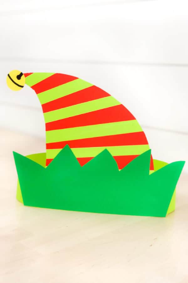 nopin="nopin" elf headband craft made with green paper and light green and red stripes