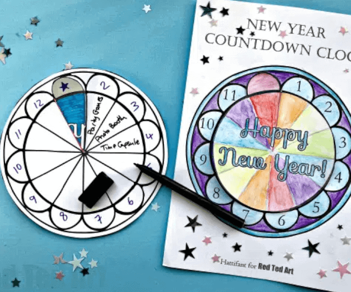 paper countdown clock for new years eve for kids in a blue backdrop